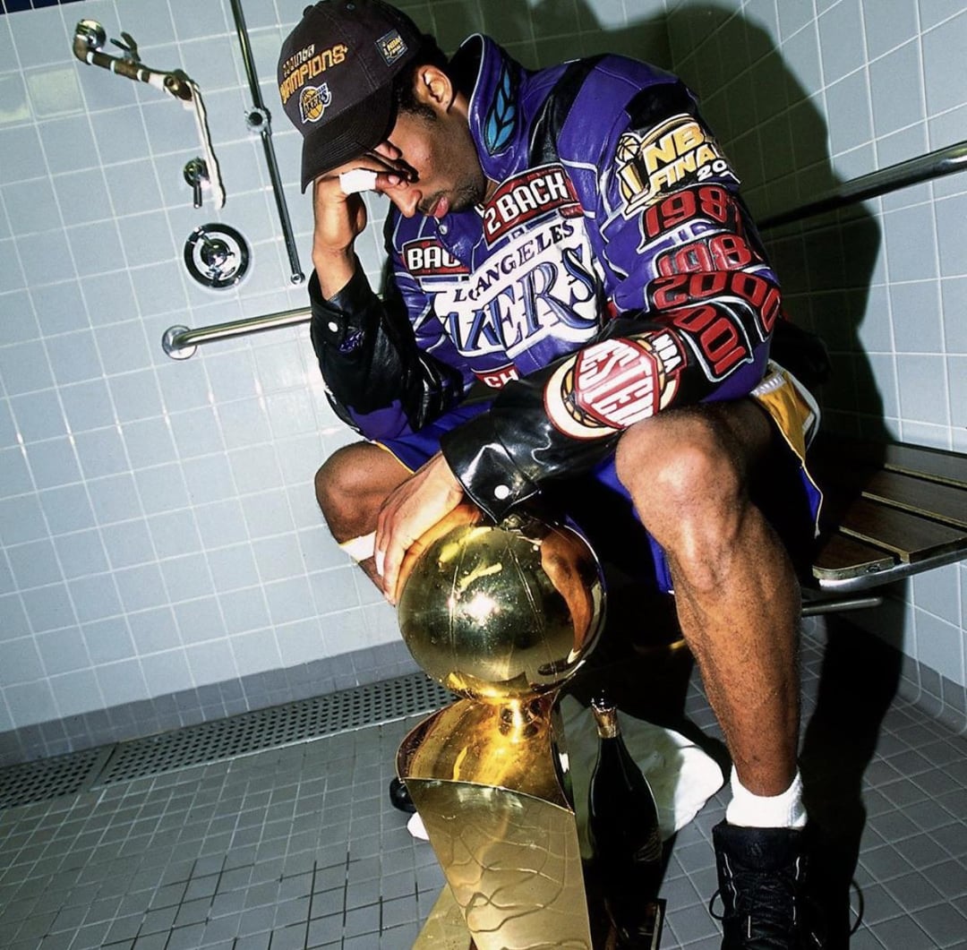 Remembering the legend: See amazing photos of Kobe holding trophy from his greatest NBA Finals wins.