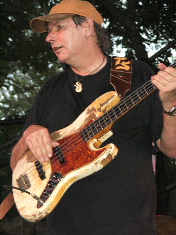 Why is Tommy Shannon considered a legend? Understand his massive influence on blues rock bass players worldwide.